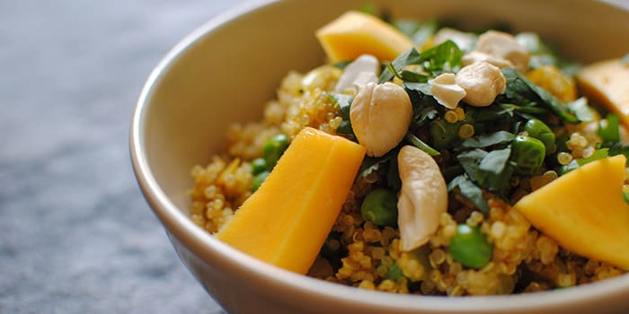 Curried Quinoa and Peas With Cashews and Fresh Mango