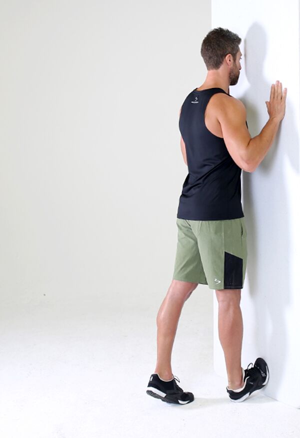 Sore Calves - Standing Wall Calf Stretch