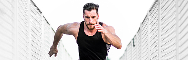 Benefits of Running – Man sprinting front angle
