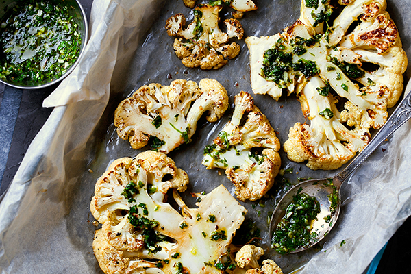 Cauliflower steaks on a sheet pan