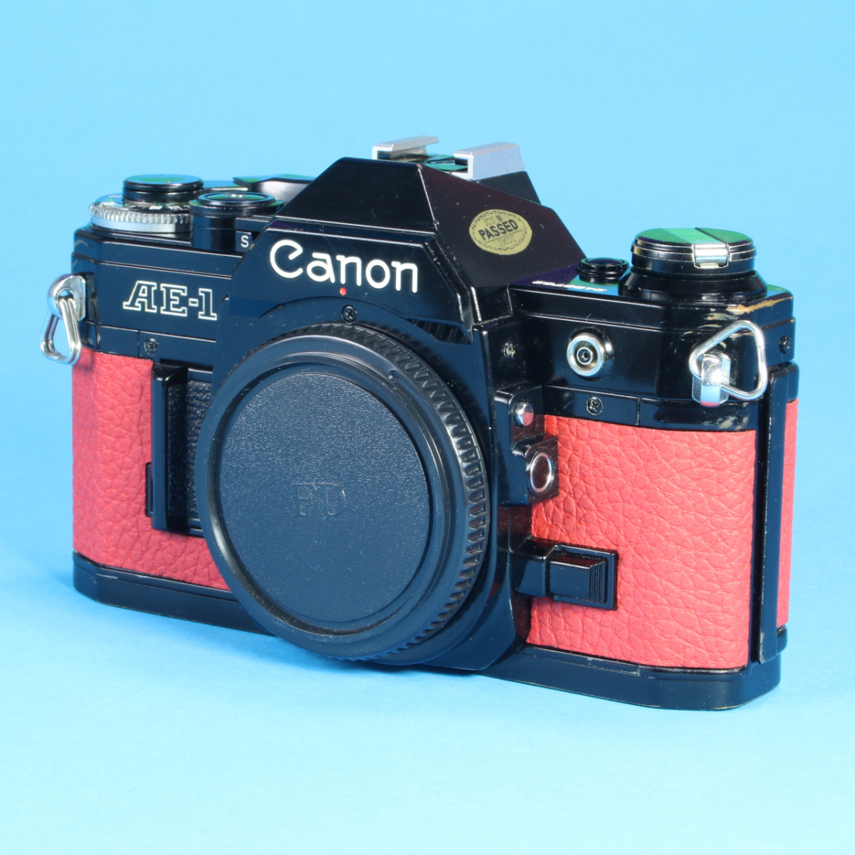 Canon AE-1 Camera - Refurbished (Re-Skinned in Red Leather