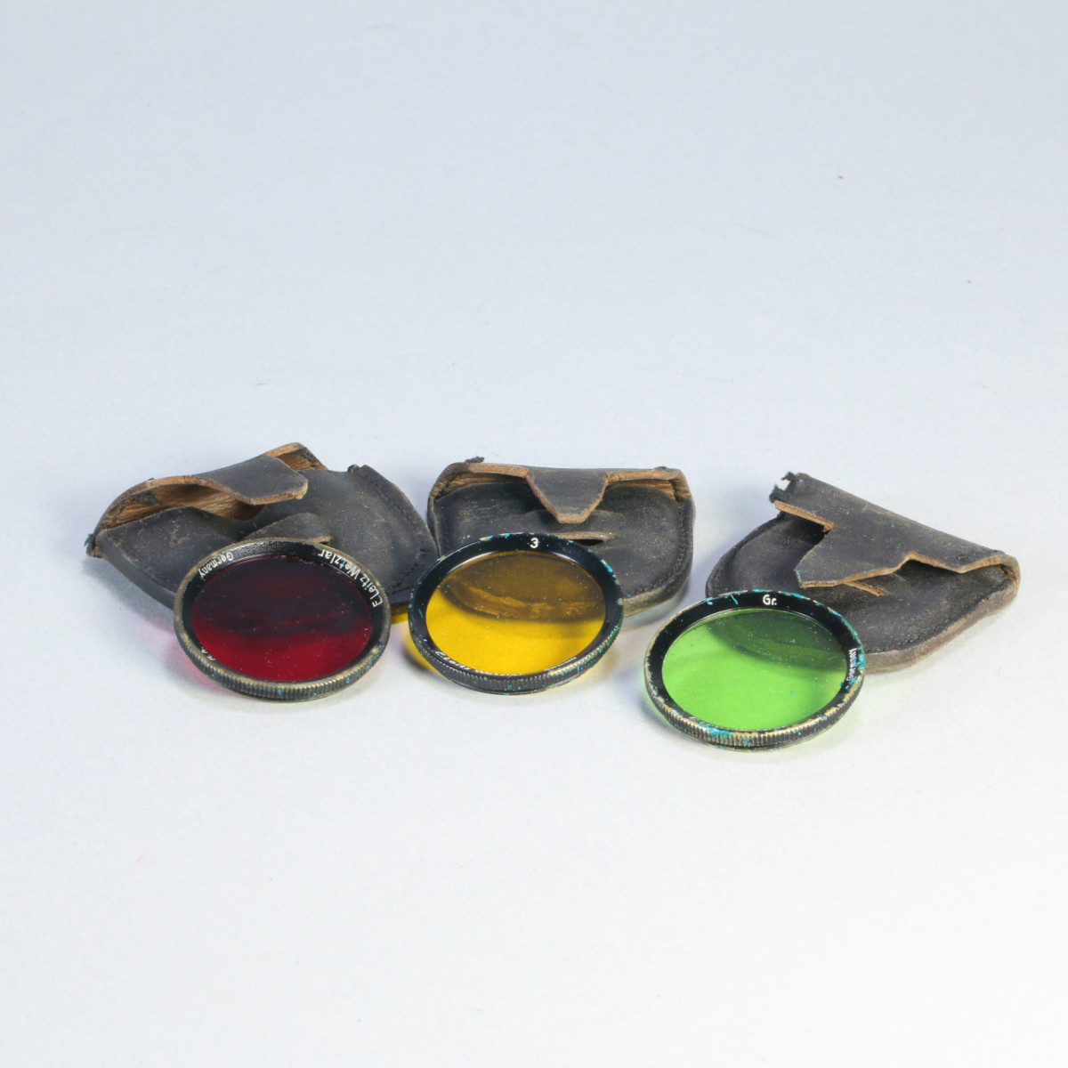 Set of Three Leica 34mm Filters for 9cm f4 Elmar: Yellow, Green, and Red