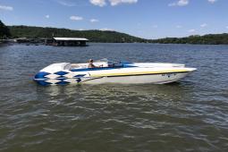 2003 Eliminator Daytona 26 ICC. With custom aluminum trailer.