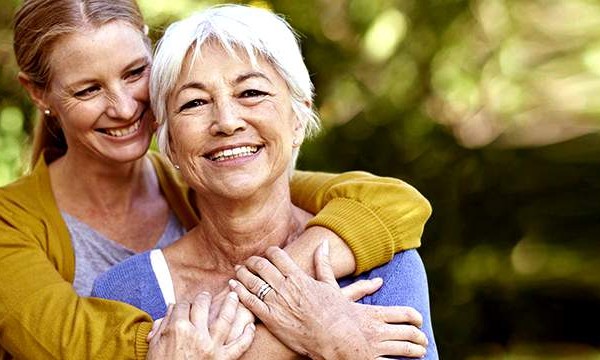 Woman Hugging Her Mother