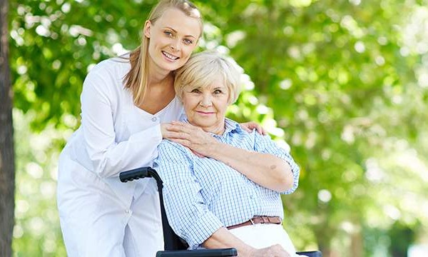 Elderly Woman And Caregiver