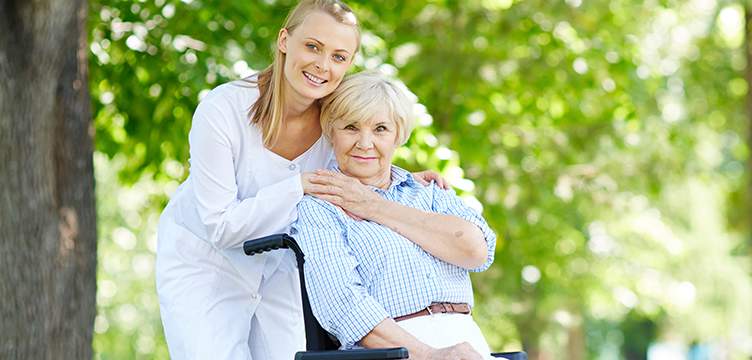 Elderly Woman And Caregiver