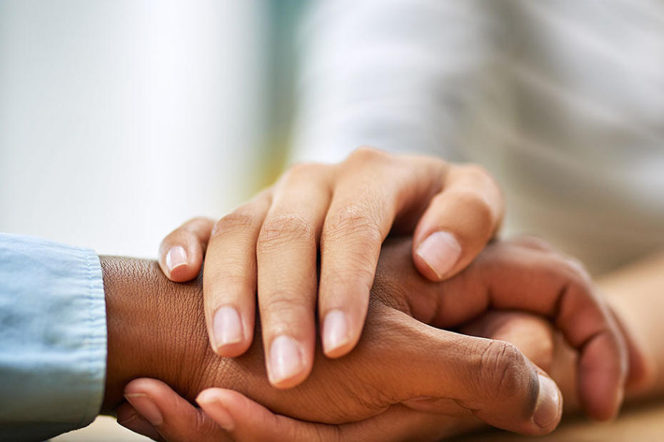 Parents holding hands