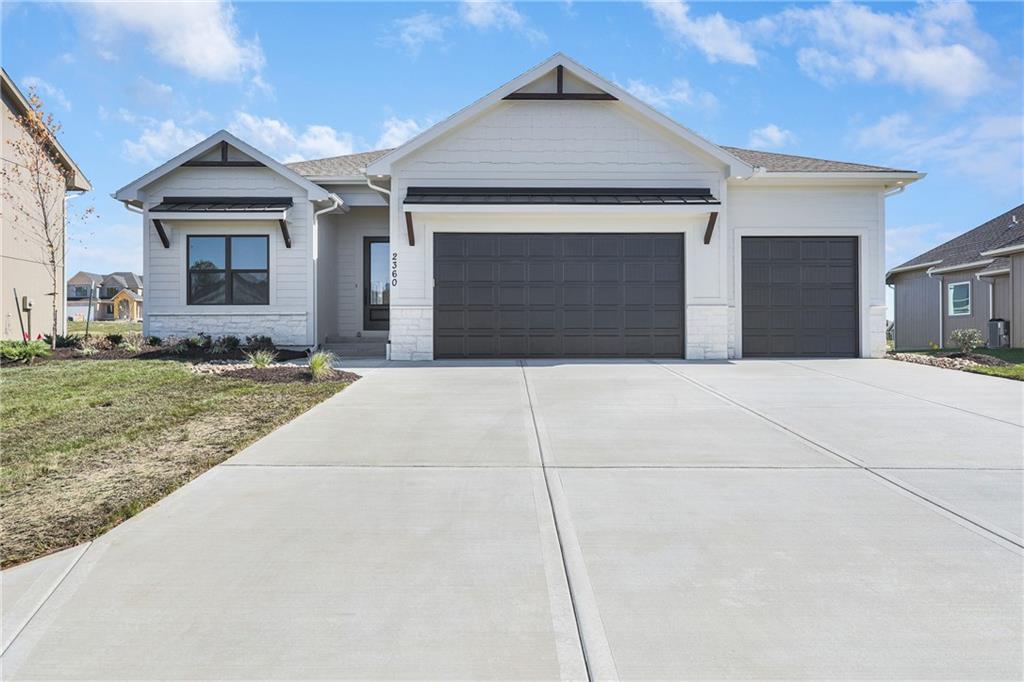7920 SE Hoot Owl Street - Photo 1