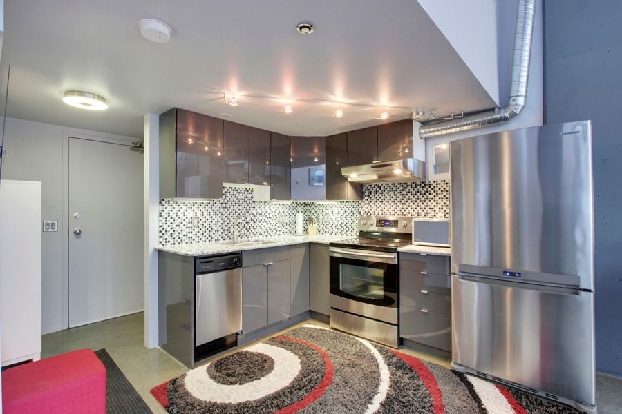 SOLD! Orange Loft 204, 535 8 Avenue SE