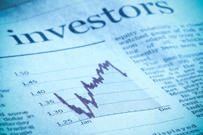 “Investment diagram in financial magazine, investors headline, Eu” “Investment diagram in financial magazine, investors headline, Eu”