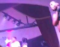 drunk shirtless guy falling offstage 