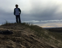 White Shirt Boogy Boards Down Sand Dune Backwards and Gets Whiplash