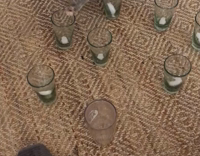 cat knocking down cups with ice 