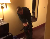 guy black shirt leaning against wall drunk with pants down 