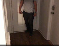 guy sliding on floor face plants 