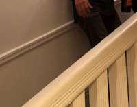 Guy tries to surf down stairs with orange boogie board 