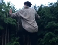 White Shirt Tries to Climb Bamboo Fence Breaks It and Falls