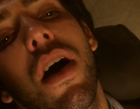 guy asleep and friends playing with his face