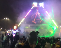 MUSIC pizza boxes stacked up on one another in trashcan 