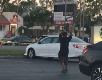 Collab Kook Of The Day - Homeless guy black shirt parking lot yoga dance
