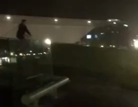 Black Jacket On Bicycle Falls Down On Grass Hill at Night