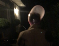 NSFW Guy with red condom blown up around his head