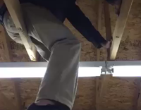 guy falls from ceiling onto table and breaks it