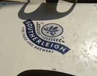 guy setting up table and praying mantis jumps on him