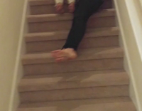 Two Drunk Blonde Women Slide Down Stairs Laughing