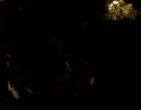 Guy in green shirt tries to kick white sign but falls to the dirt