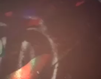 music guy waving fists in air and dancing