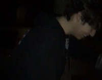 guy in black shirt falling off motorcycle 