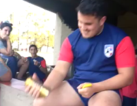 nsfw Guy blue shirt red sleeves smashes beer on head until it completely explodes