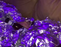 passed out man wrapped in tin foil