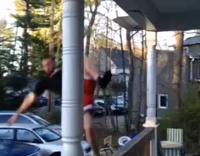 NSFW Guy in red shorts falls on dirt in front of a house 