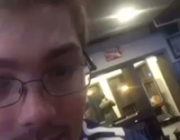 guy in back being filmed by guy in blue 