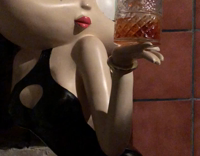 Guy knocks over alcohol in hand of Betty Boop statue 