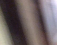 guy black shirt sliding on ground and sticking tongue out 