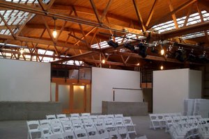 Preview of 415 Westlake - Image 1: historic, Light Fixture, Auditorium, Hall, Room, Theater, Conference Room, Meeting Room, structure wood, skylight, mezzanine, concrete floor, concrete wall, meeting space, wedding, Historic.