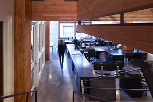 Preview of Architects Office - Image 0: Conference Room, Indoors, Meeting Room, Room, Building, Factory, concrete floor, steel table, structure wood, steel stair, wood ceiling, heavy timber, office, mezzanine, historic.