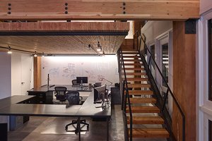 Preview of Architects Office - Image 1: Handrail, Staircase, Lathe, Machine, Flooring, Dining Table, Furniture, Table, Conference Room, Indoors, Meeting Room, Room, meeting space, mezzanine, steel stair, concrete floor, steel table, office, glulam, wood ceiling, Historic.