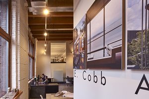 Preview of Architects Office - Image 2: Dining Table, Furniture, Table, Plywood, Wood, Indoors, Interior Design, concrete floor, office, steel table, structure wood, heavy timber, lighting, interior glass, Historic.