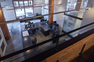 Preview of Architects Office - Image 4: Dining Table, Furniture, Table, Lathe, Machine, Building, Office Building, meeting space, office, concrete floor, steel tables, structure wood, interior glass, glulam, mezzanine, lighting.