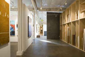 Preview of Grand Image - Image 1: Corridor, Floor, Flooring, Banister, Handrail, Staircase, gallery, display, concrete floor, structure wood, art, rolling door.