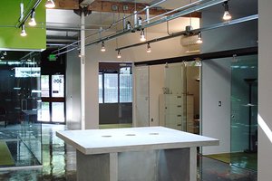 Preview of Ip Resources - Image 1: Track Lighting, Skylight, Concrete, Glass, Meeting Room, Entry, Door, Window, Exposed Structure, systems, glass interior, concrete counter.