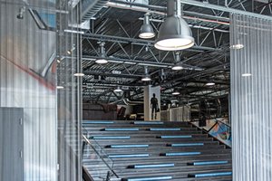 Preview of Light Manufacturing - Image 5: Dining Table, Steel, Concrete, Exposed Structure, Exposed Duct, Chainmail, Stair, Staircase, Seating, Curtain, Structure Steel.