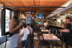 Preview of Mamnoon Street - Image 1: Human, Person, Bar Counter, Wood, Steel, Glass, Window, Dining Table, Restaurant, Bar.