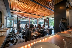 Preview of Mamnoon Street - Image 2: People, Oven, Restaurant, Exercise, Sports, Steel, Wood, Glass, WIndow, Door, Concrete, Dining Table.