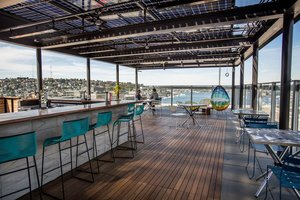 Preview of Mbar - Image 0: Deck, Chair, Concrete, Wood, Steel, Structure Steel, Pergola, Dining Table, Bar, Rooftop, Outdoor.