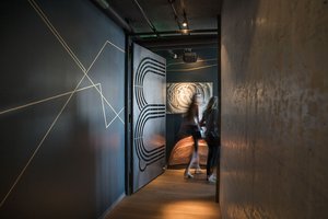 Preview of Mbar - Image 5: Female, Person, Tunnel, Hall, Concrete, Wood, Steel, Entry, Restaurant.